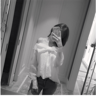 Γυναικεία  μπλούζα με φιόγκο στο μπροστινό μέρος