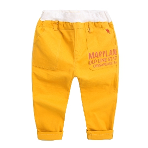 Παιδικά παντελόνια για αγόρια για την άνοιξη και το φθινόπωρο σε κίτρινο και μπεζ χρώμα