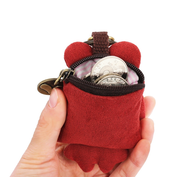 Οι γυναίκες αξεσουάρ κουτάβι - τηλέφωνο ή τα κλειδιά