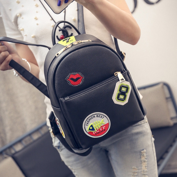 Дамска кожена раница: бяла и черна