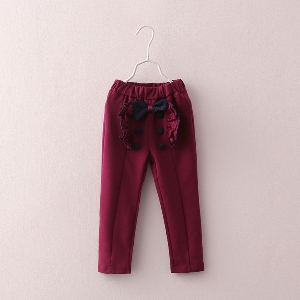 Модерни детски панталони за момичета в черен и лилав цвят