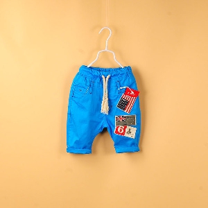 Къси ластични панталони за деца подходящи за момчета - жълти и сини