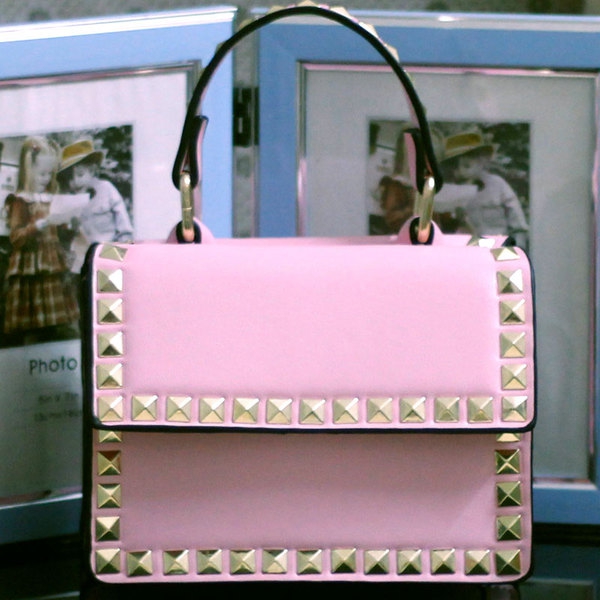 Γυναικεία μικρά συμπαγή τσάντα με καρφιά στο μπροστινό μέρος