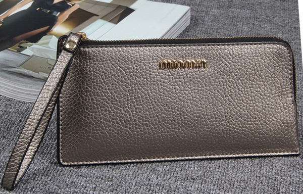 Дамски портфейли в черен,цикламен,бежов,син,червен,черен,сив и розов цвят