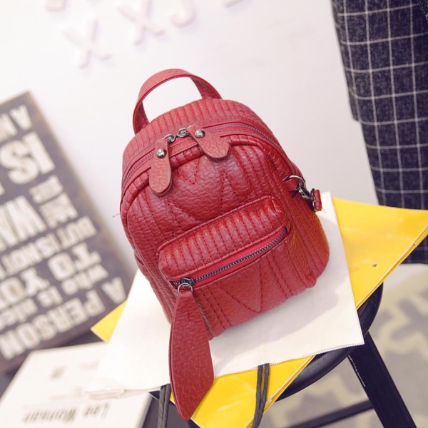 Мини раница с дълга дръжка, с функция за носене през рамо