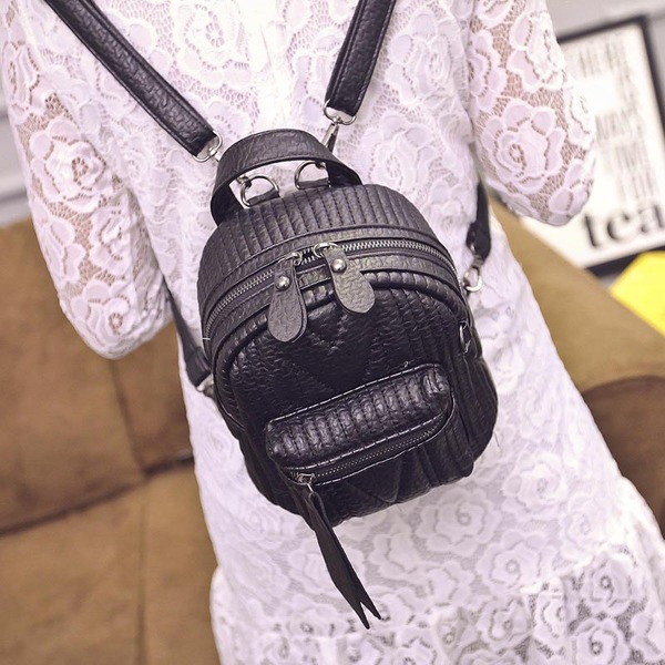 Мини раница с дълга дръжка, с функция за носене през рамо