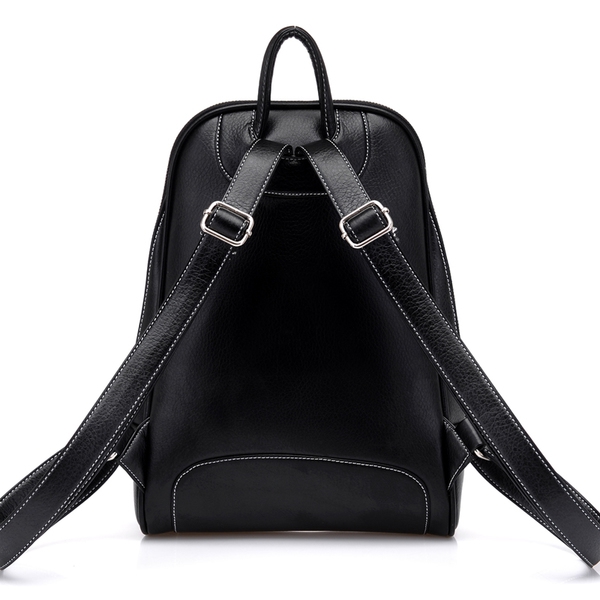 Ένα μικρό μοντέλο του σακίδιο - μπεζ, καφέ και μαύρο