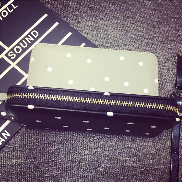 Οι γυναίκες σημεία χαρτοφυλάκια σε μαύρο και μπεζ