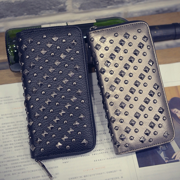 Οι γυναίκες χαρτοφυλακίου από δέρμα σε δύο χρώματα - μαύρο και γκρι