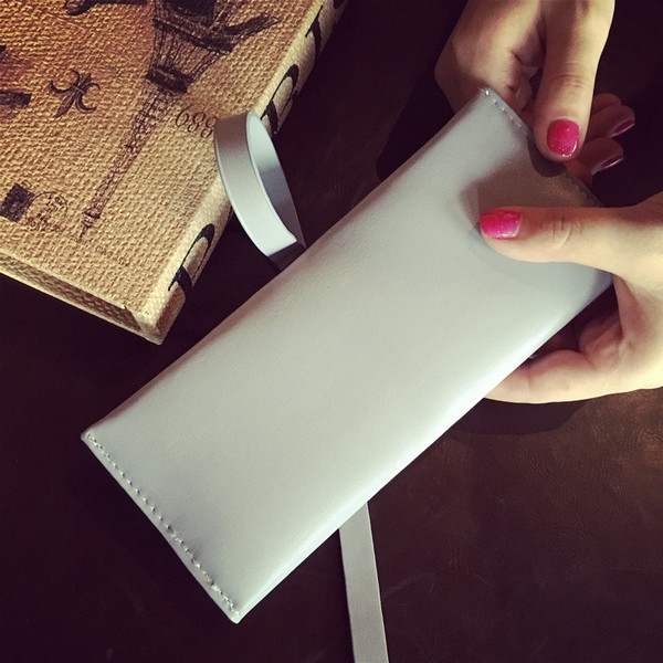 Γυναικείο πορτοφόλι σε τεχνητό δέρμα σε λευκό, πράσινο, μπλε και καφέ