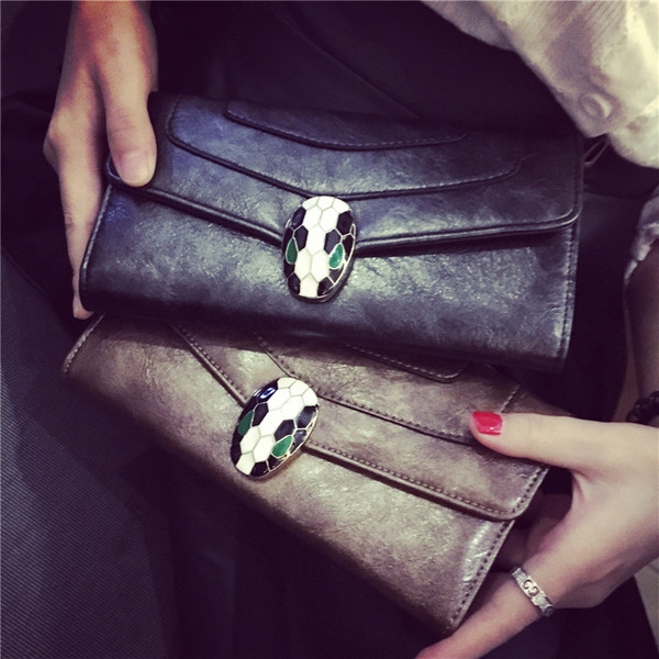 Γυναικείο πορτοφόλι από τεχνητό δέρμα σε μαύρο και καφέ