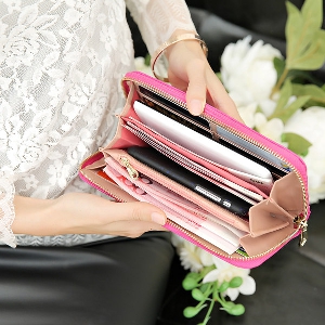 Дамски портфейли в сребрист,черен,розов,червен,цикламен,син и жълт цвят