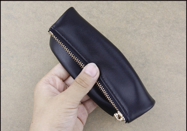 Οι γυναίκες πορτοφόλι σε μωβ, μαύρο και φούξια χρώμα - 3 μοντέλα