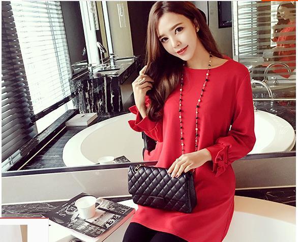 Φόρεμα σε μαύρο και ροζ χρώμα για τις έγκυες γυναίκες.