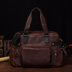 Компактна   чанта за ръчен багаж изработена от изкуствена кожа 