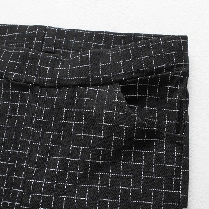 Дамски еластичен клин в черно или бяло на квадратчета със задни джобове