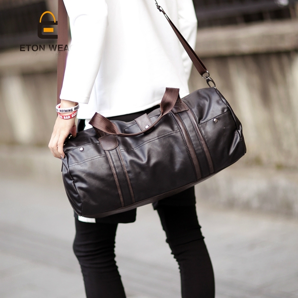 Ταξιδιωτικές τσάντες σε μαύρο και μπλε από συνθετικό δέρμα