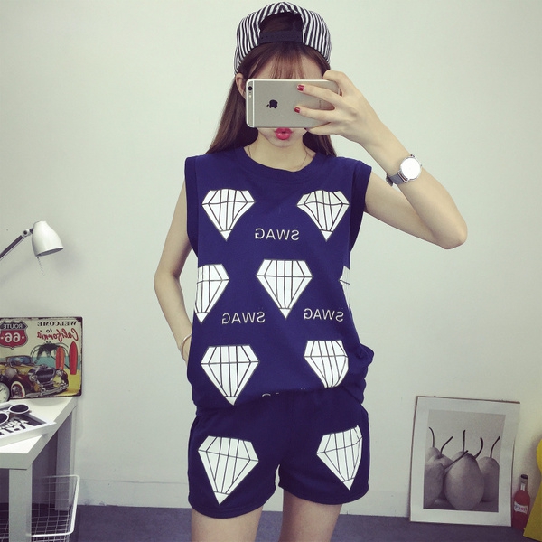 Γυναικεία ολόσωμη καλοκαιρινή φόρμα σε σκούρο μπλε  και σορτς