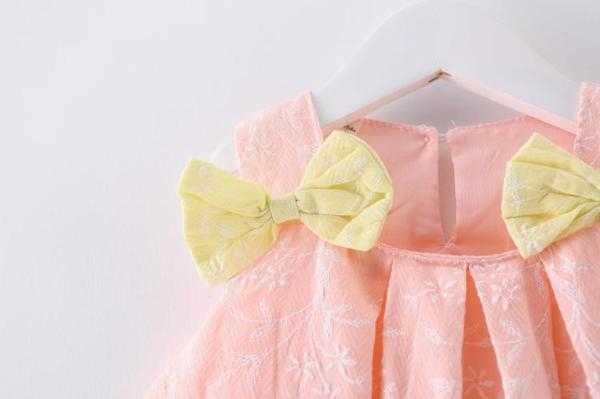 Бебешка розово рокля с жълти панделки