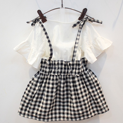 Детска рокличка за момичета с карирана поличка един модел.