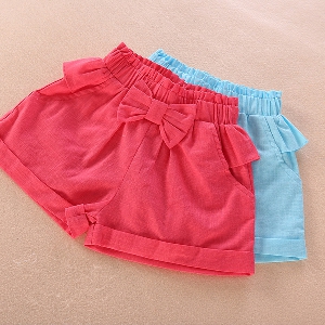 Детски къси панталони за момичета: червени и сини с панделка