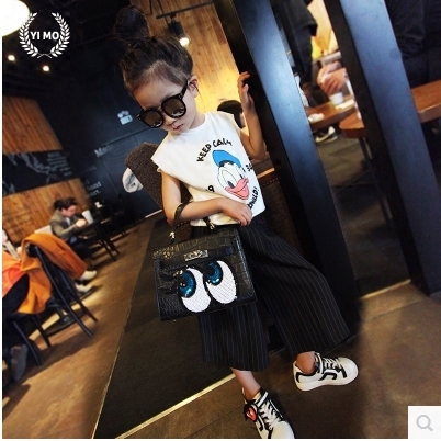 Бели и черни детски тениски за момичета с Donald Duck.