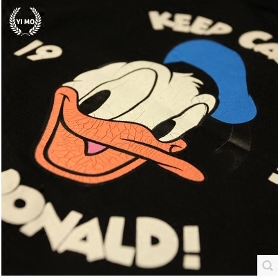 Бели и черни детски тениски за момичета с Donald Duck.