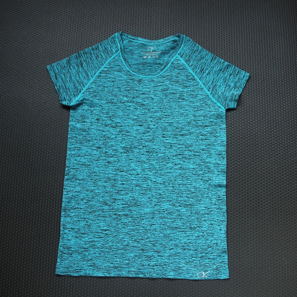 Γρήγορη ξήρανση αθλητικών γυναικών μπλουζών σε μπλε, πράσινο, γκρι, κυκλάμινο και πορτοκαλί χρώμα