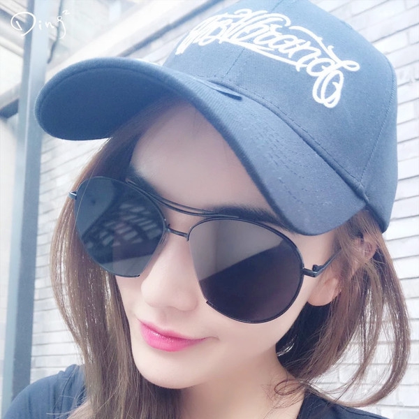 γυαλιά ηλίου των γυναικών Quan Zhilong