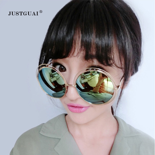 Големи кръгли слънчеви очила в различни отблясъци:черно , златисто, синьо и оранжево