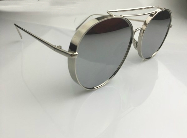 Дамски слънчеви очила заоблена форма, със златиста и сребриста рамка