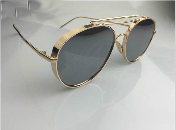 Дамски слънчеви очила заоблена форма, със златиста и сребриста рамка
