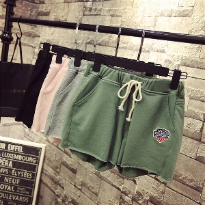 Дамски спортни панталони в сив,розов,зелен и черен цвят.
