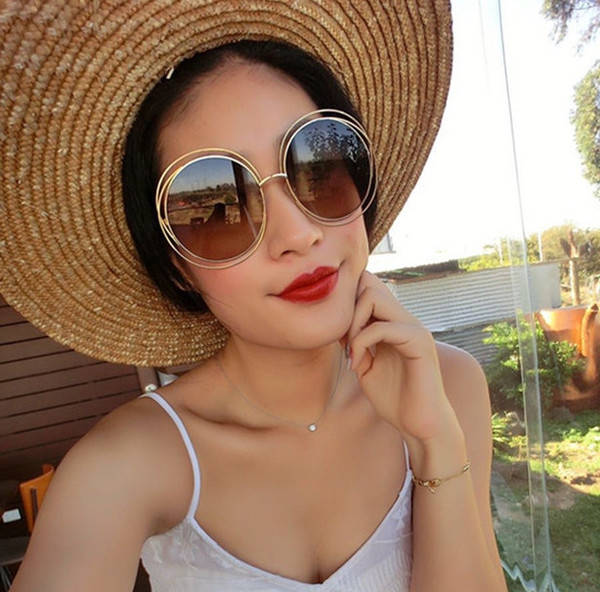 Големи кръгли дамски слънчеви очила в кафяв цвят