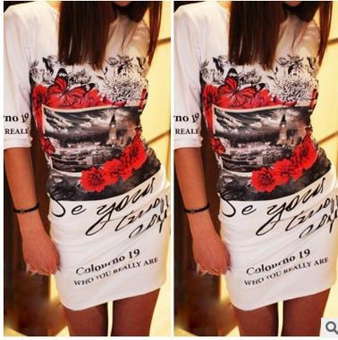 Дамскa рокля в бял и черен цвята с принт и флорални мотиви.