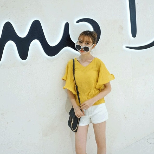 Οι γυναίκες κίτρινο καλοκαίρι τυπικό μέγεθος πουκάμισο