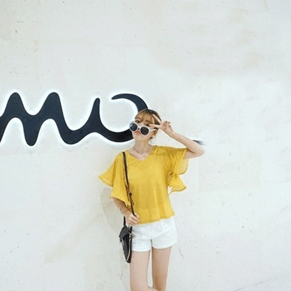 Οι γυναίκες κίτρινο καλοκαίρι τυπικό μέγεθος πουκάμισο