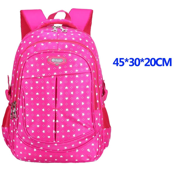 Детски раници за училище за момичета в четири цвята със сърца.