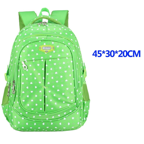 Детски раници за училище за момичета в четири цвята със сърца.