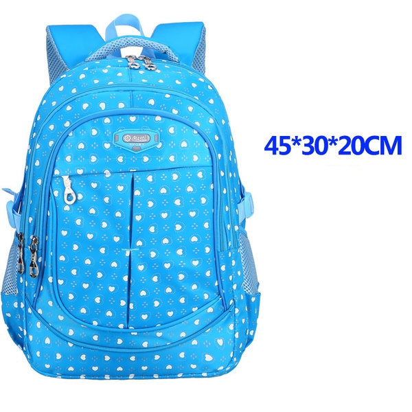 Детски раници за училище за момичета в четири цвята със сърца.