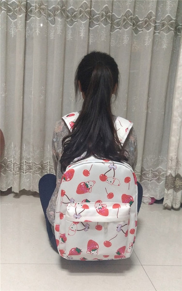 Ученическа раница с мека повърхност за момичета - черна, бяла и розова с ягодки - височина:40 см, дължина 30 см