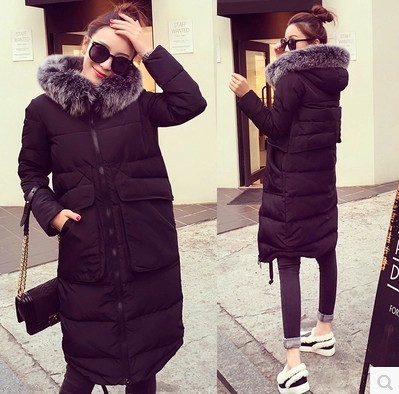 Γυναικείο   μπουφάν για το  χειμώνα  μαύρο μοντέλο με  γκρι αφράτη κουκούλα μέχρι  το γόνατο