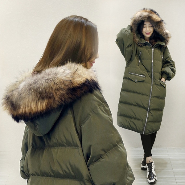 Дамско зимно яке с качулка с еко пух и пълнеж, подходящо за студените дни-зелено и черно.