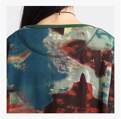 Μακρύ πουλόβερ με  μεγάλο ριγέ μοτίβο.