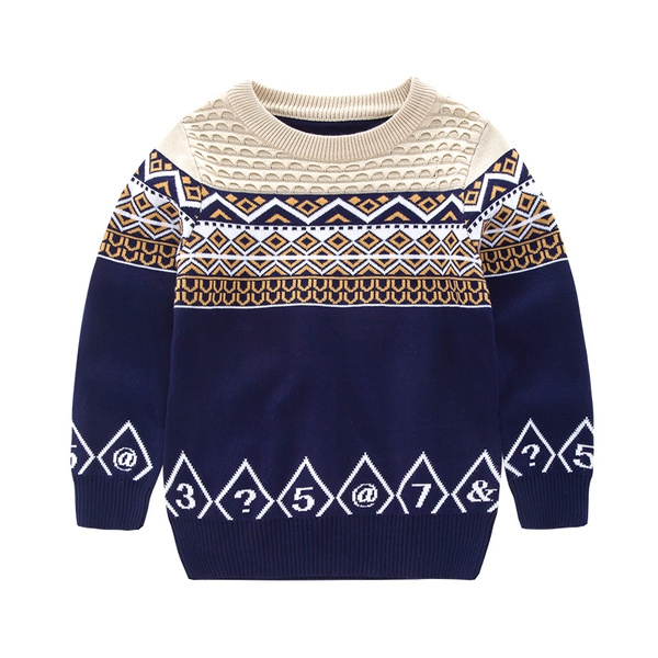 Παιδικά πουλόβερ με εθνοτικές μοτίβα σε κόκκινο και μπλε χρώμα.