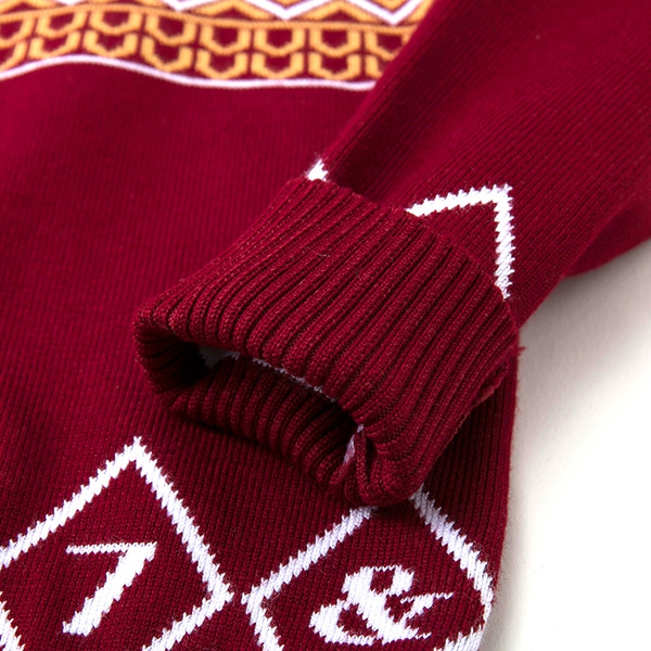 Παιδικά πουλόβερ με εθνοτικές μοτίβα σε κόκκινο και μπλε χρώμα.