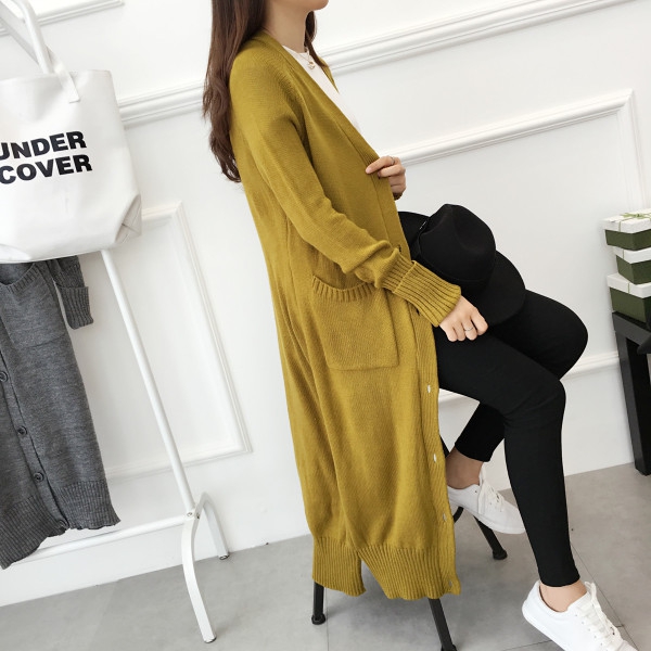 Дълга широка жилетка с дълги ръкави в три цвята.