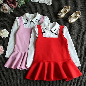 Стилна детска рокля в розово и червено с дълъг ръкав риза
