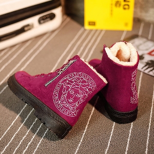 Γυναικείες  χειμωνιάτικες μπότες δύο μοντέλα με συνδέσμους - διαφορετικά χρώματα.