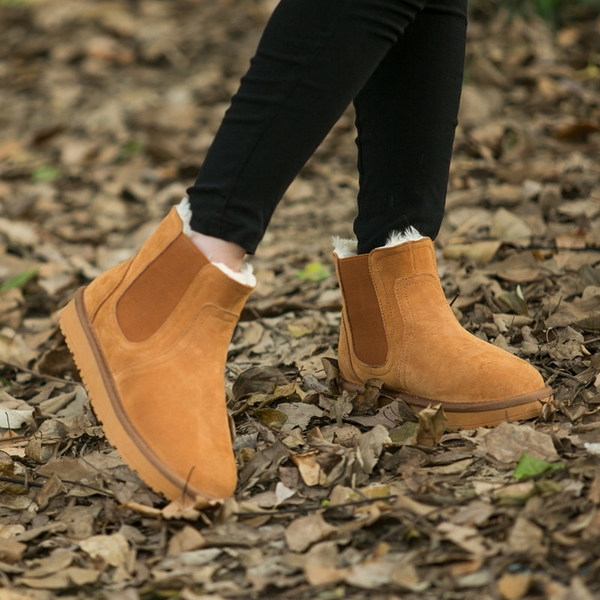 Ζεστές χειμωνιάτικες μπότες σε χρώματα χειμώνας